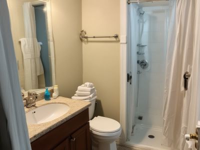 Before renovation: small cramped bathroom with limited space, basic fixtures, and outdated design